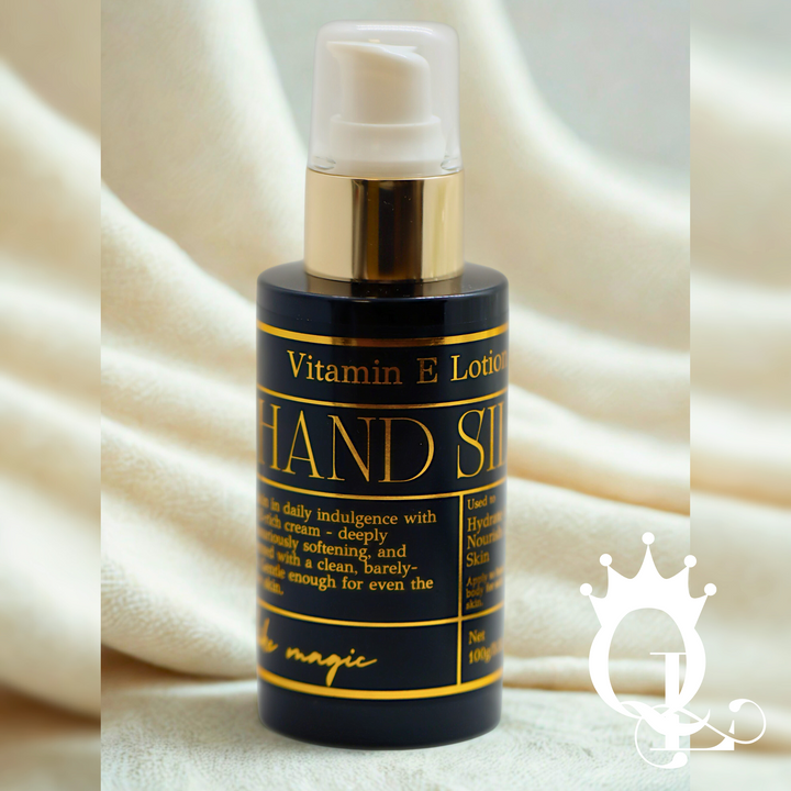 Vitamin E lotion bottle with gold cap on a beige fabric background