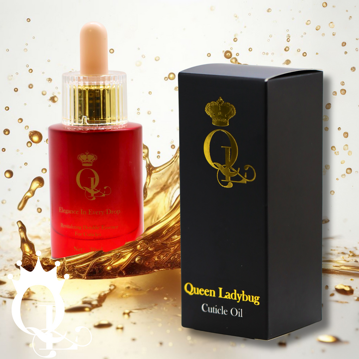Red bottle and black box of Queen Ladybug cuticle oil on a gold and white splash of oil, background